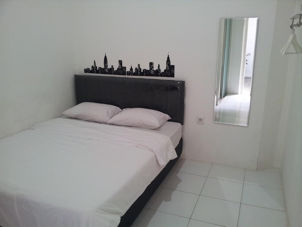 Loxy Inn Surabaya Szoba fotó