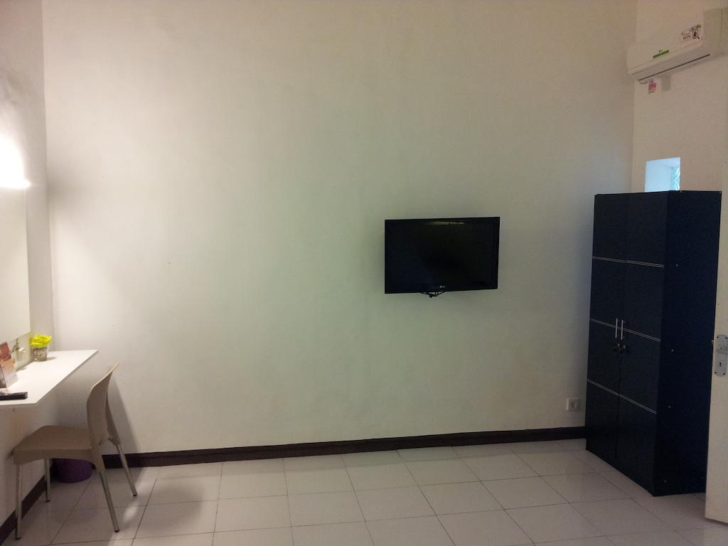 Loxy Inn Surabaya Szoba fotó